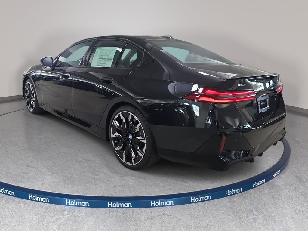 New 2027 Black Sapphire Metallic BMW 550e xDrive image 7