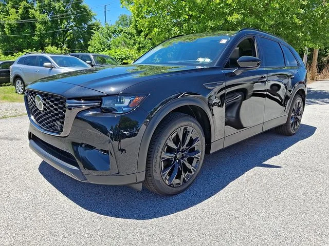 New 2026 Black Mazda Premium image 2