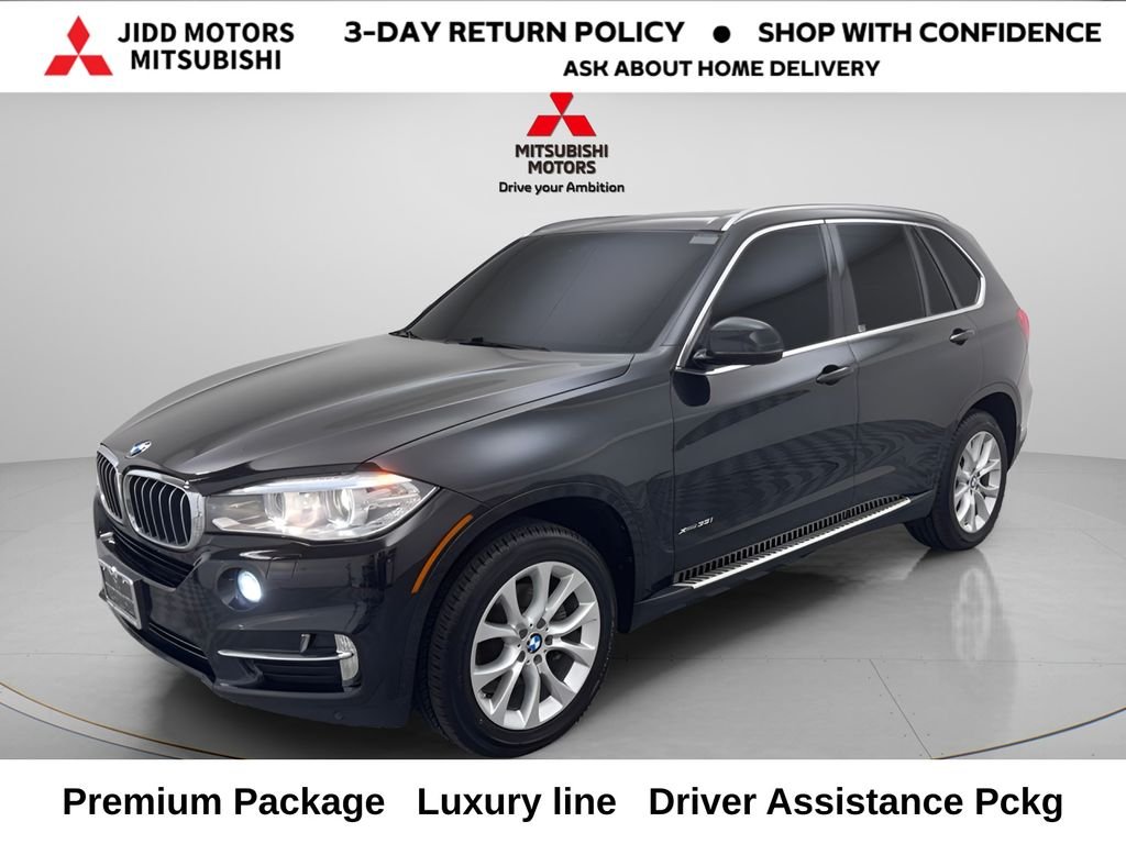 Used 2015 Black Sapphire Metallic BMW xDrive35i image 1