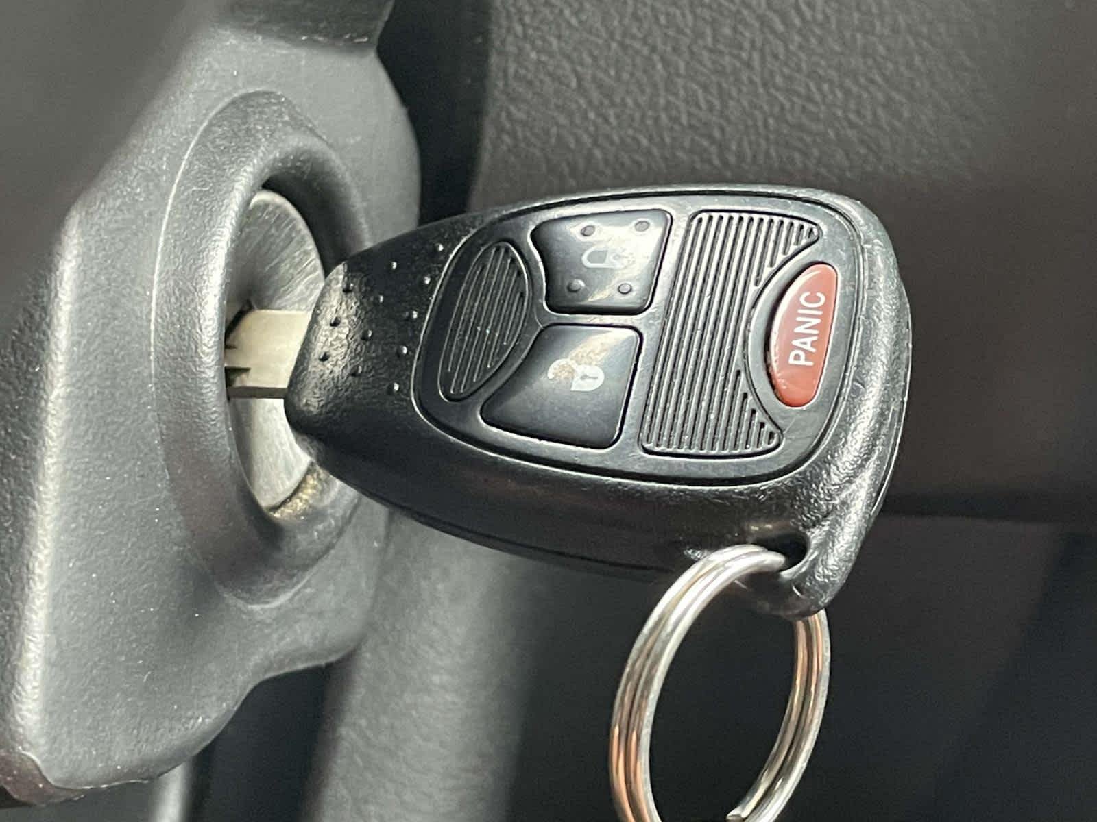 Used 2011 Blackberry Pearl Jeep Sport image 4