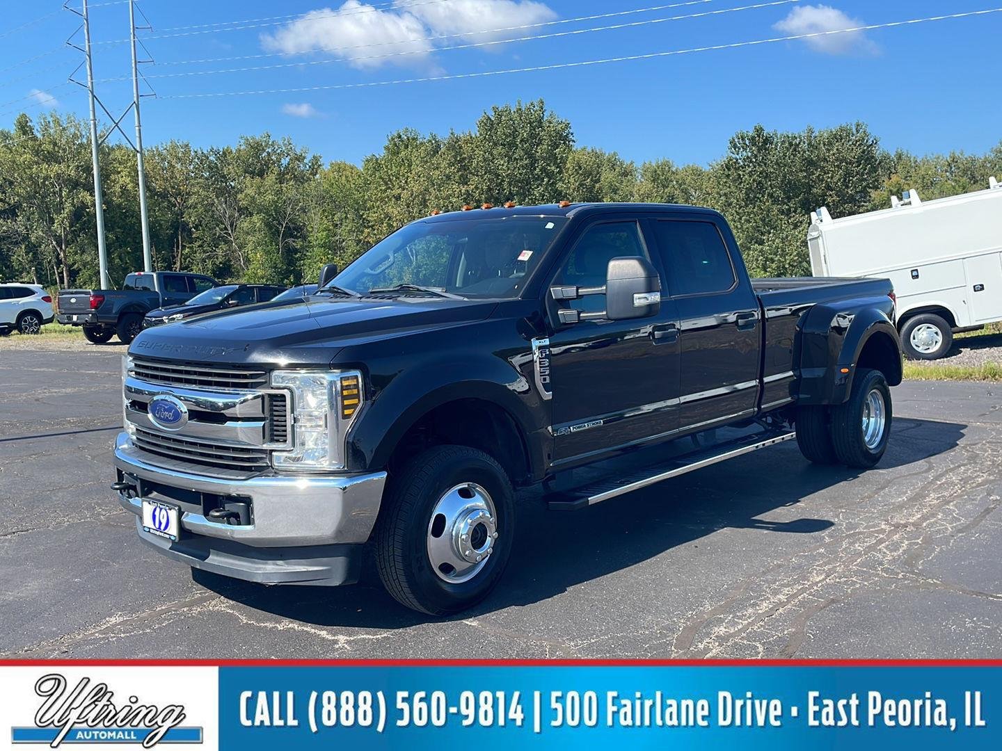Used 2019 Agate Black Metallic Ford XLT image 1