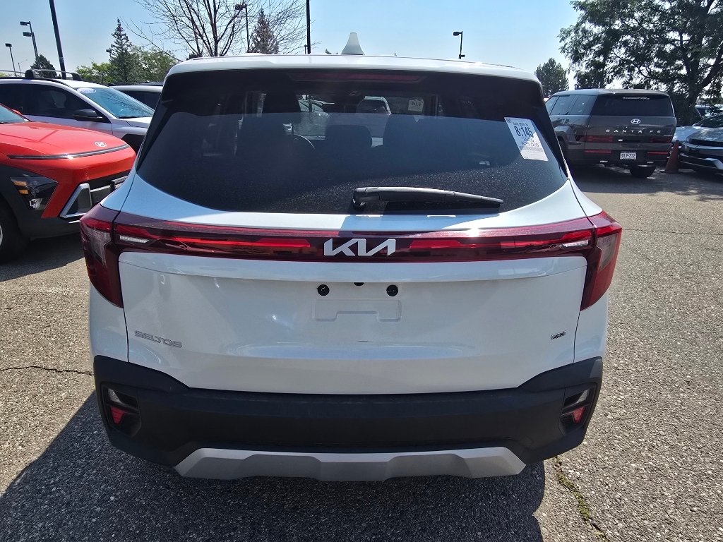 Used 2026 Snow White Pearl Kia LX image 4