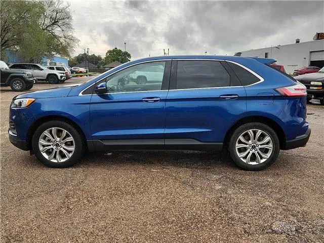 Used 2024 Blue Ford Titanium All-Wheel Drive image 2