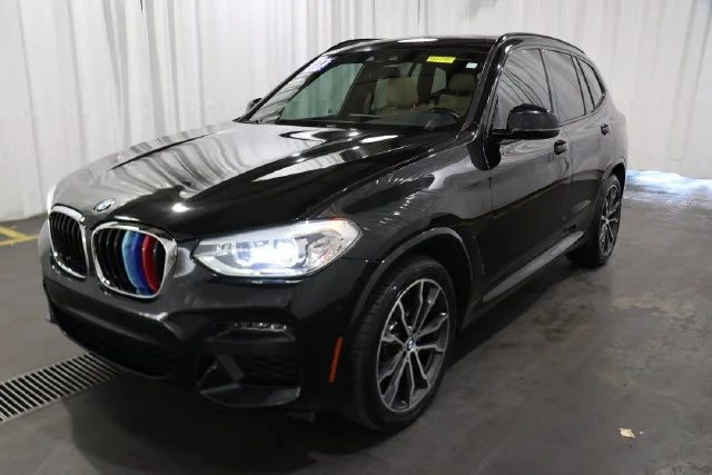 Used 2021 Black Sapphire Metallic BMW xDrive30i image 32