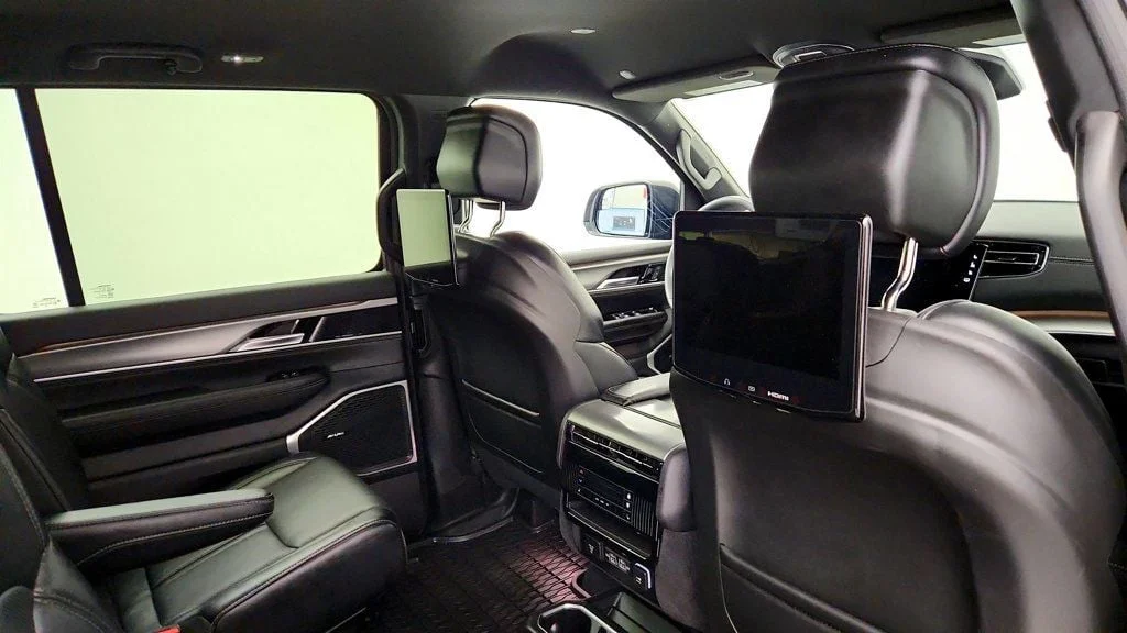 Used 2025 Diamond Black Crystal Pearlcoat Jeep Series II Carbide 4x4 w/ Rear Entertainment & 20
