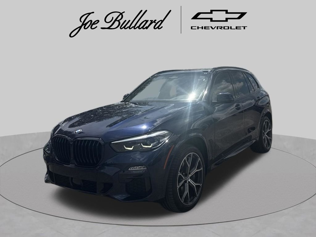 Used 2021 Blue BMW M50i image 1