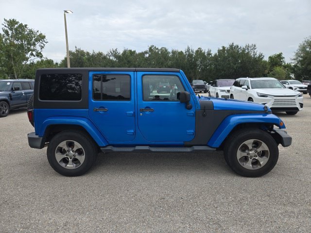 Used 2016 Hydro Blue Pearlcoat Jeep Sahara image 6