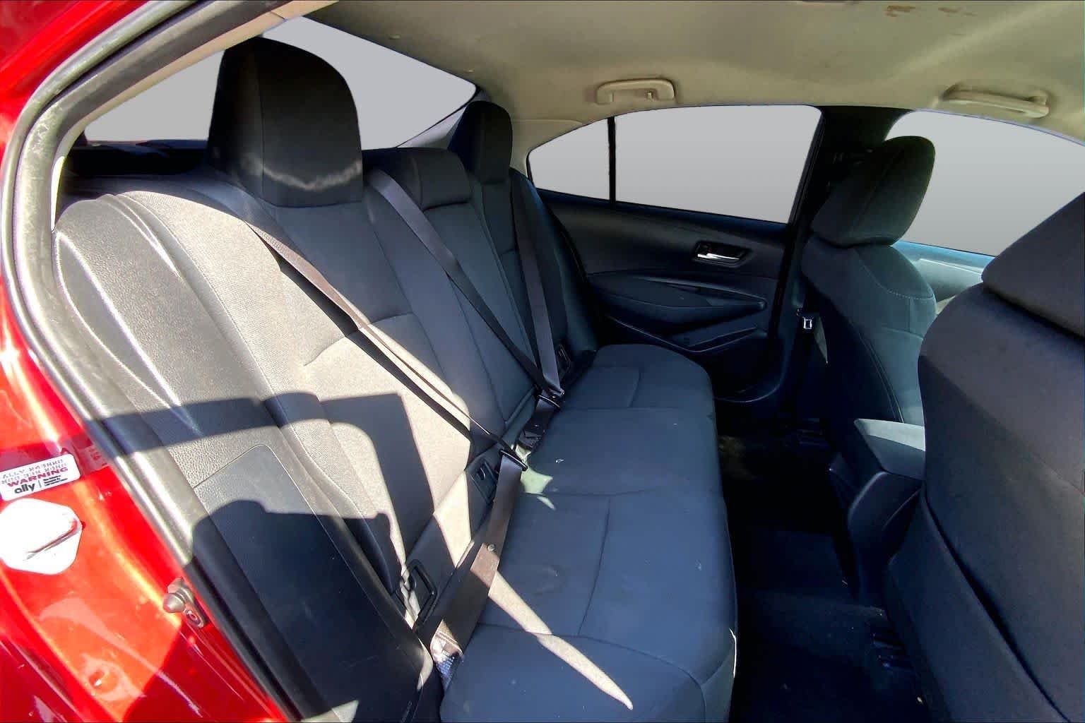 Used 2021 Barcelona Red Metallic Toyota LE image 19