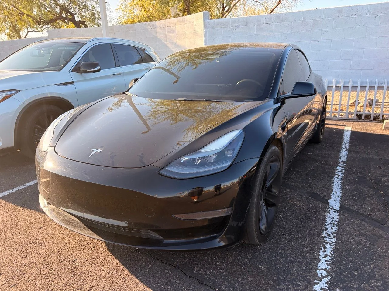 Used 2022 Solid Black Tesla Base image 2