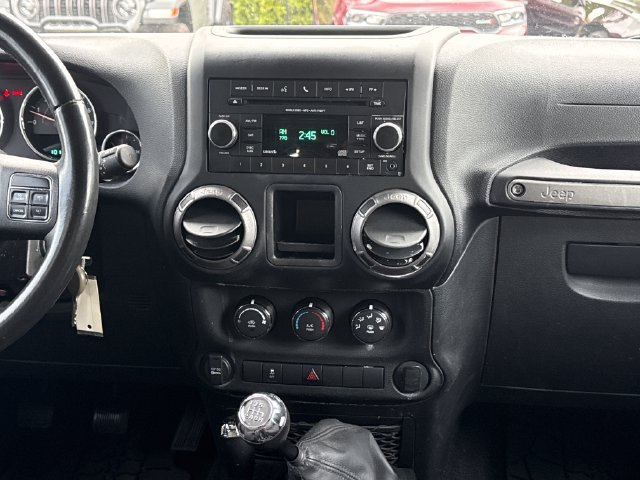 Used 2012 Black Clearcoat Jeep Unlimited Sport image 7