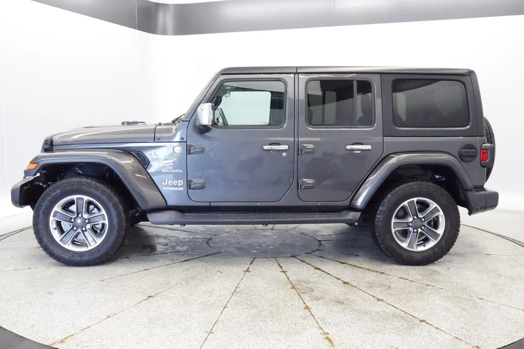 Used 2019 Jeep Wrangler Unlimited Sahara with VIN 1C4HJXEN1KW535822 for sale in Coon Rapids, Minnesota