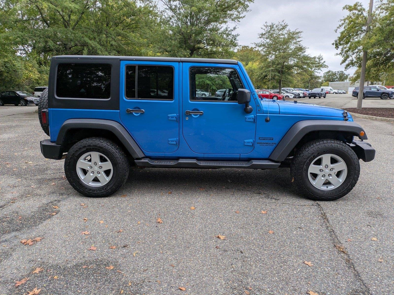 Used 2015 Hydro Blue Pearl Coat Jeep Sport image 3