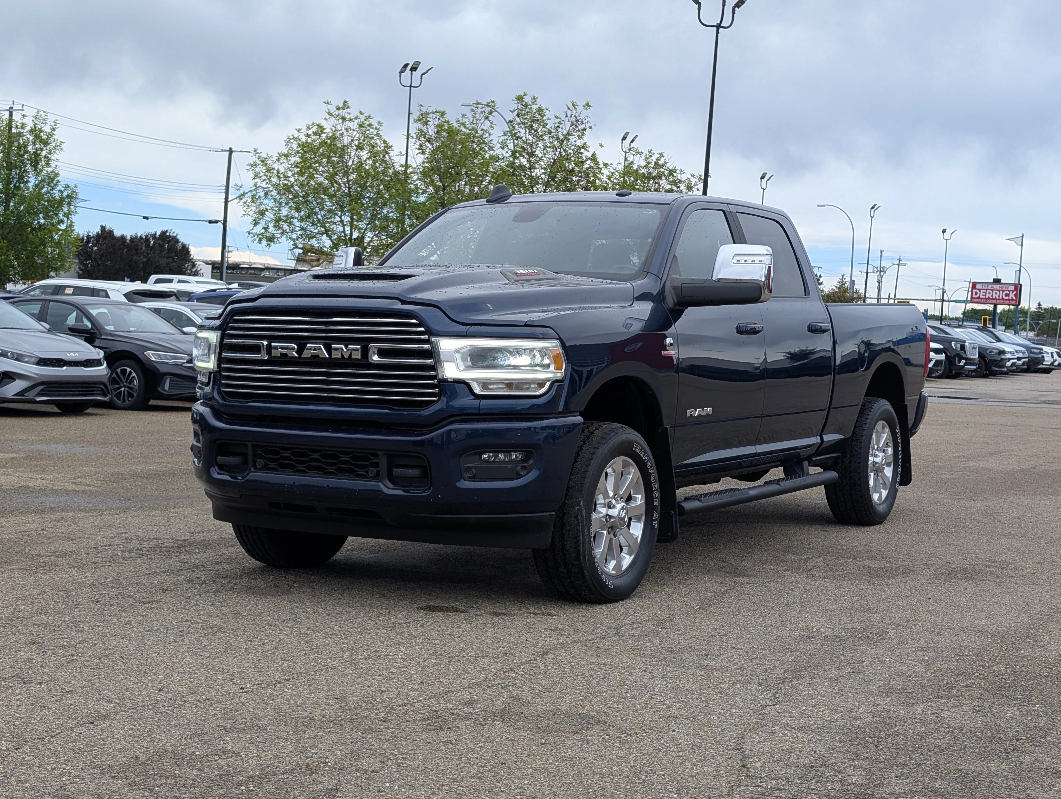 Used 2023 Patriot Blue Pearl Ram Laramie image 2