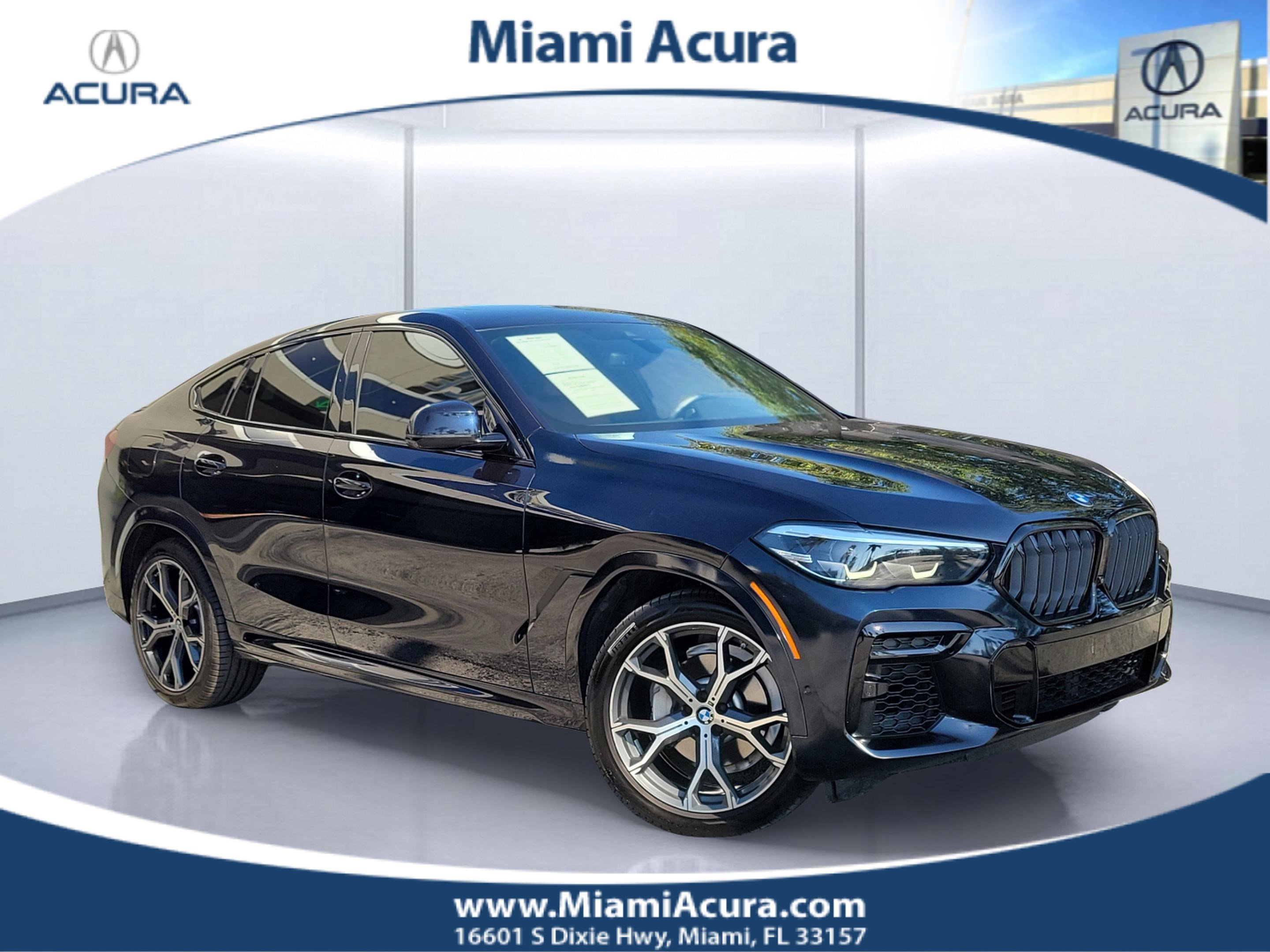Used 2022 Carbon Black Metallic BMW xDrive40i image 1