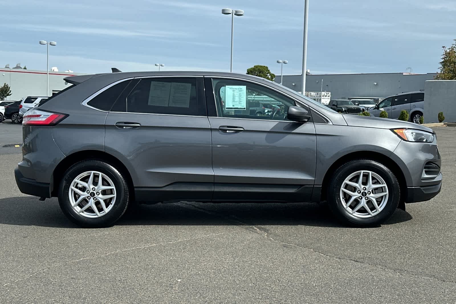 Used 2024 Carbonized Gray Metallic Ford SEL image 6