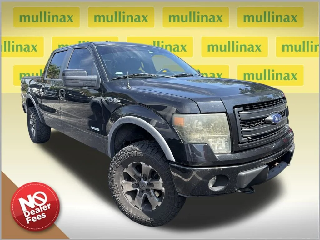 Used 2013 Black Ford FX4 image 1