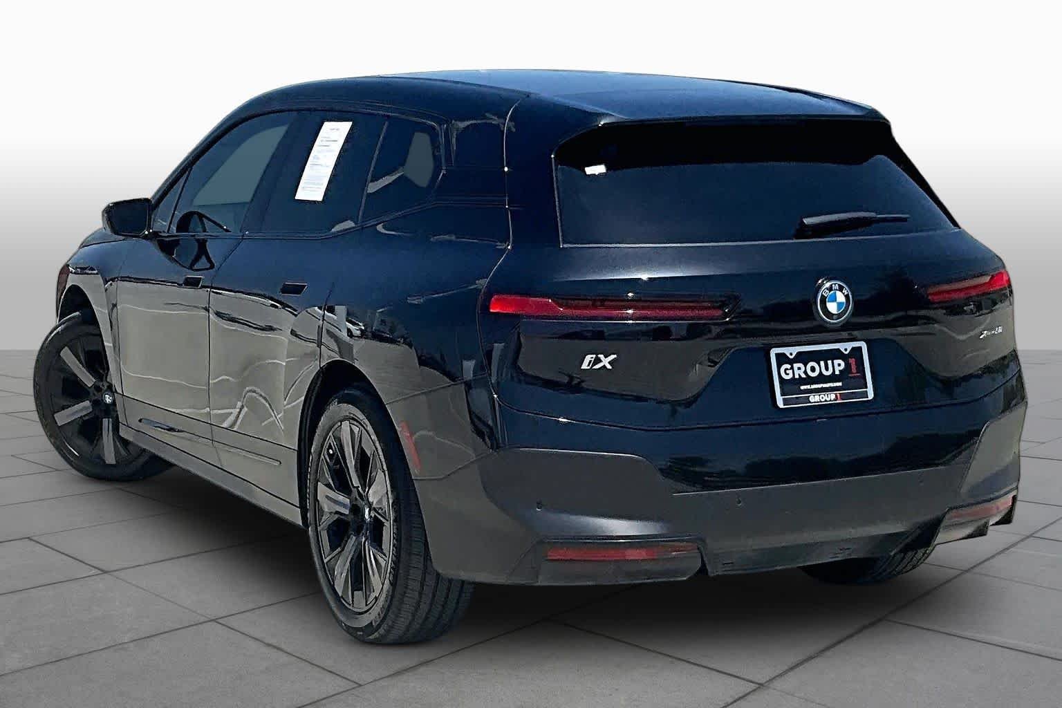 Used 2024 Black Sapphire Metallic BMW xDrive50 image 11