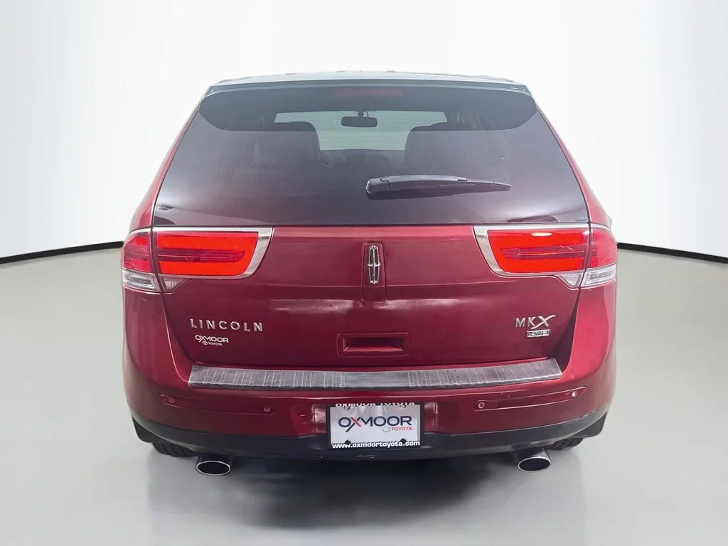 Used 2014 Ruby Red Metallic Tinted Clearcoat Lincoln Base image 6