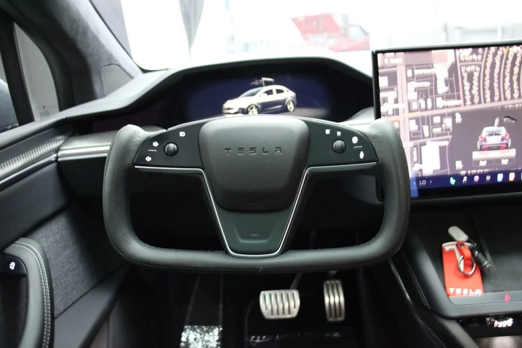 Used 2022 Solid Black Tesla Plaid image 47