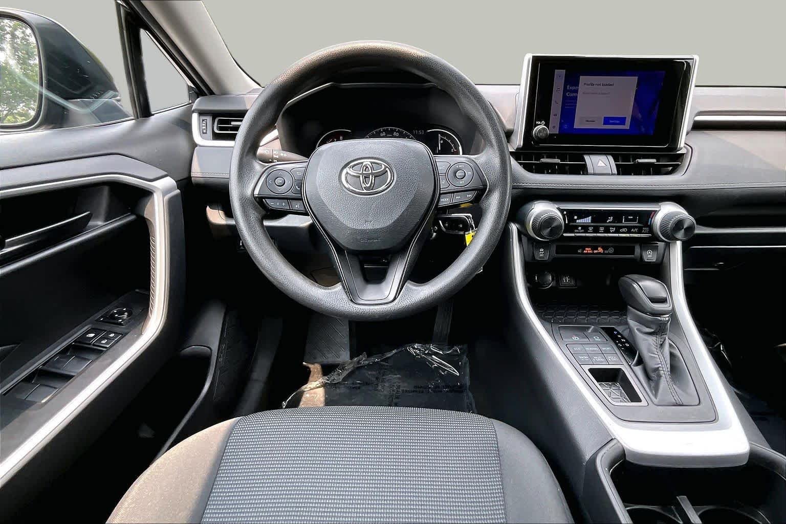 Used 2023 Midnight Black Metallic Toyota LE image 6
