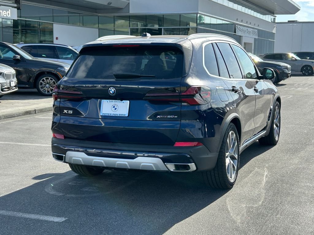 New 2026 Tanzanite Blue II Metallic BMW xDrive50e image 5