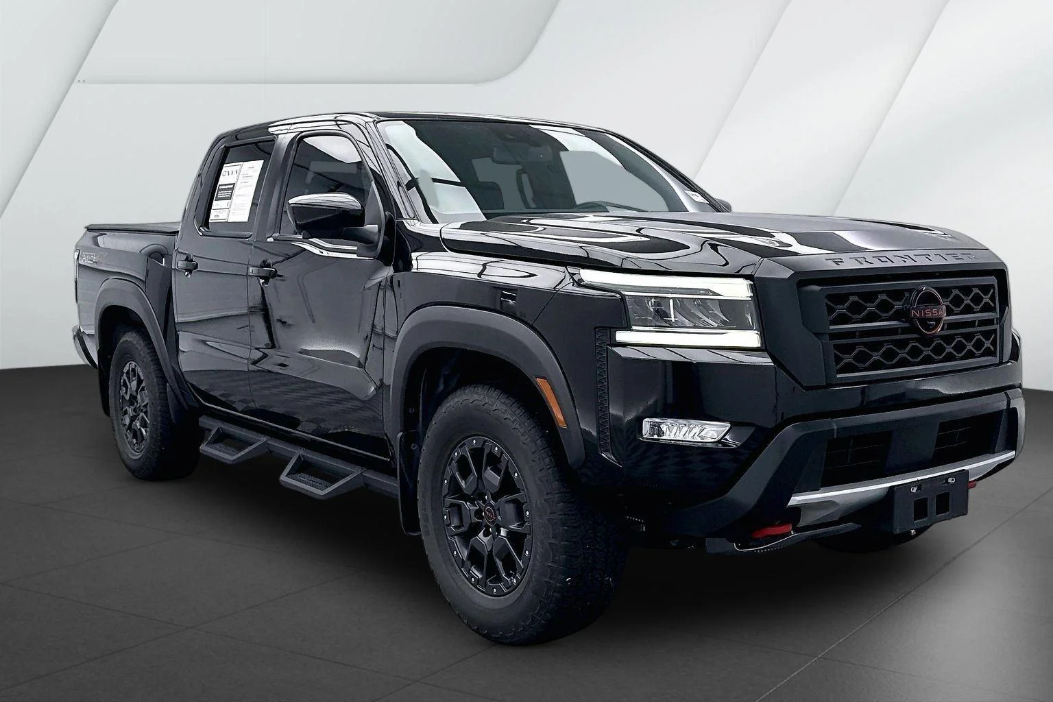 Used 2022 Super Black Nissan PRO-4X image 1