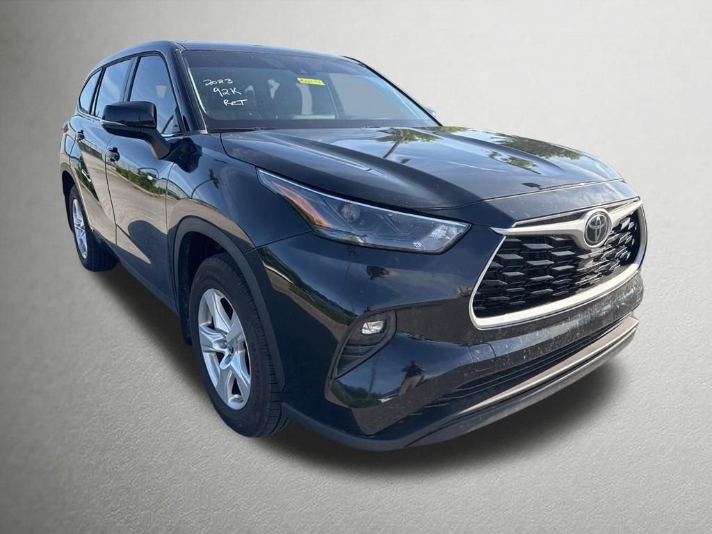 Used 2023 Midnight Black Metallic Toyota LE image 1