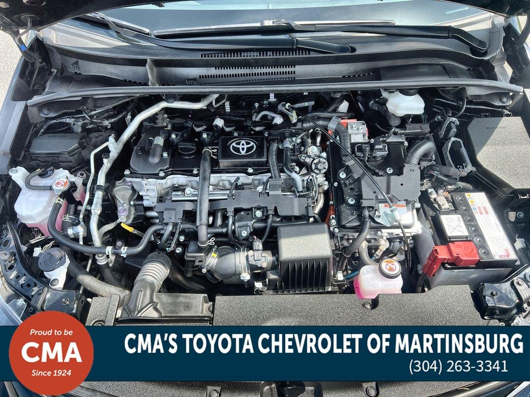 Used 2025 Midnight Black Metallic Toyota Hybrid LE image 12