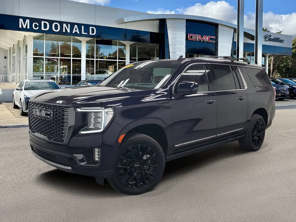 Used 2024 Midnight Blue Metallic GMC Denali Ultimate image 1