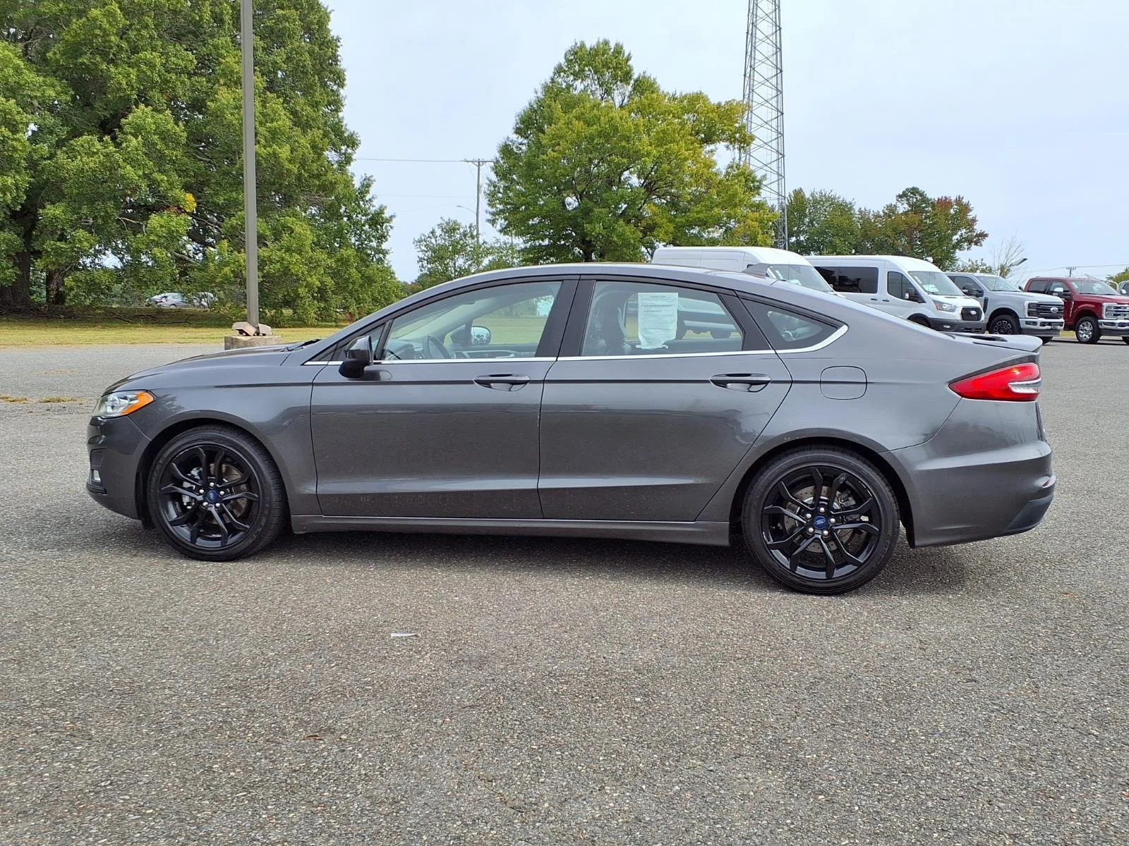 Used 2020 Magnetic Metallic Ford SE image 3