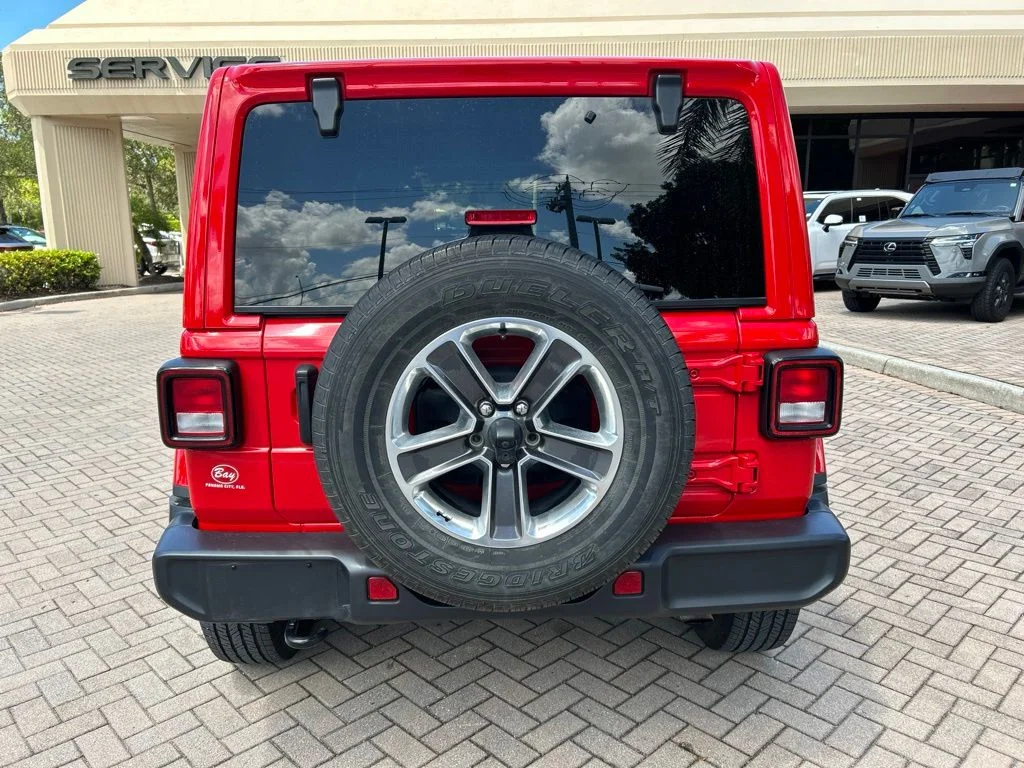 Used 2021 Red Jeep Unlimited Sahara image 4