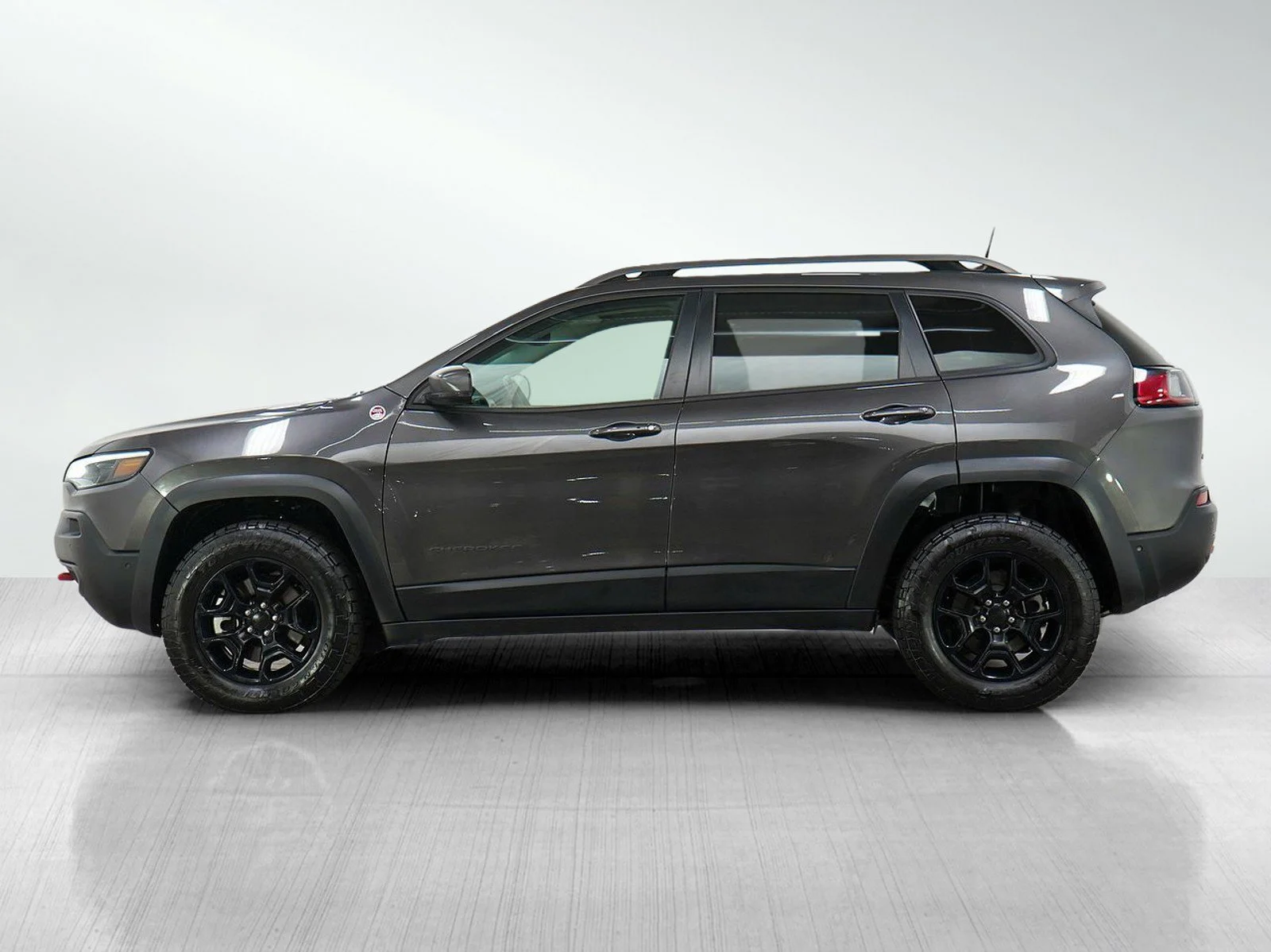 Used 2021 Jeep Cherokee Trailhawk with VIN 1C4PJMBX8MD102965 for sale in Burnsville, Minnesota