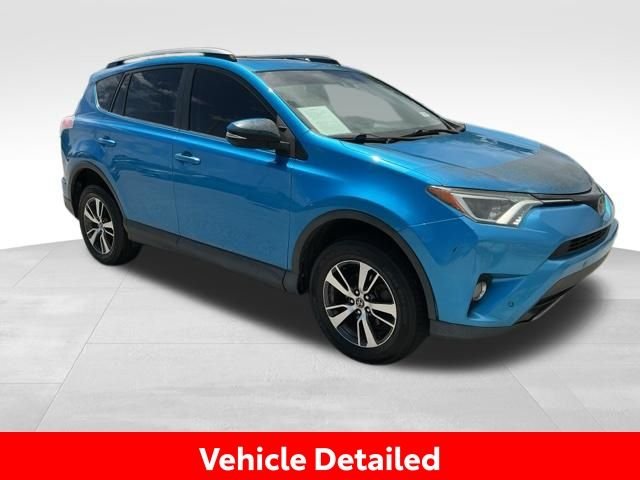 Used 2017 Toyota RAV4 XLE with VIN JTMWFREV0HD095147 for sale in Lake Park, FL