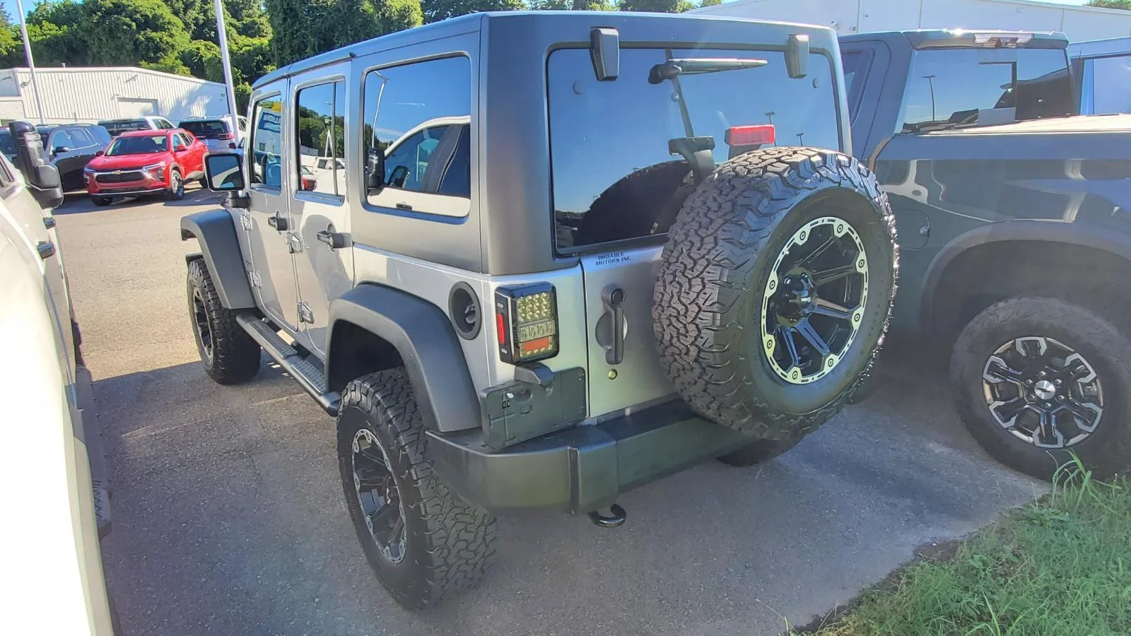 Used 2013 Billet Silver Metallic Clearcoat Jeep Sport image 8