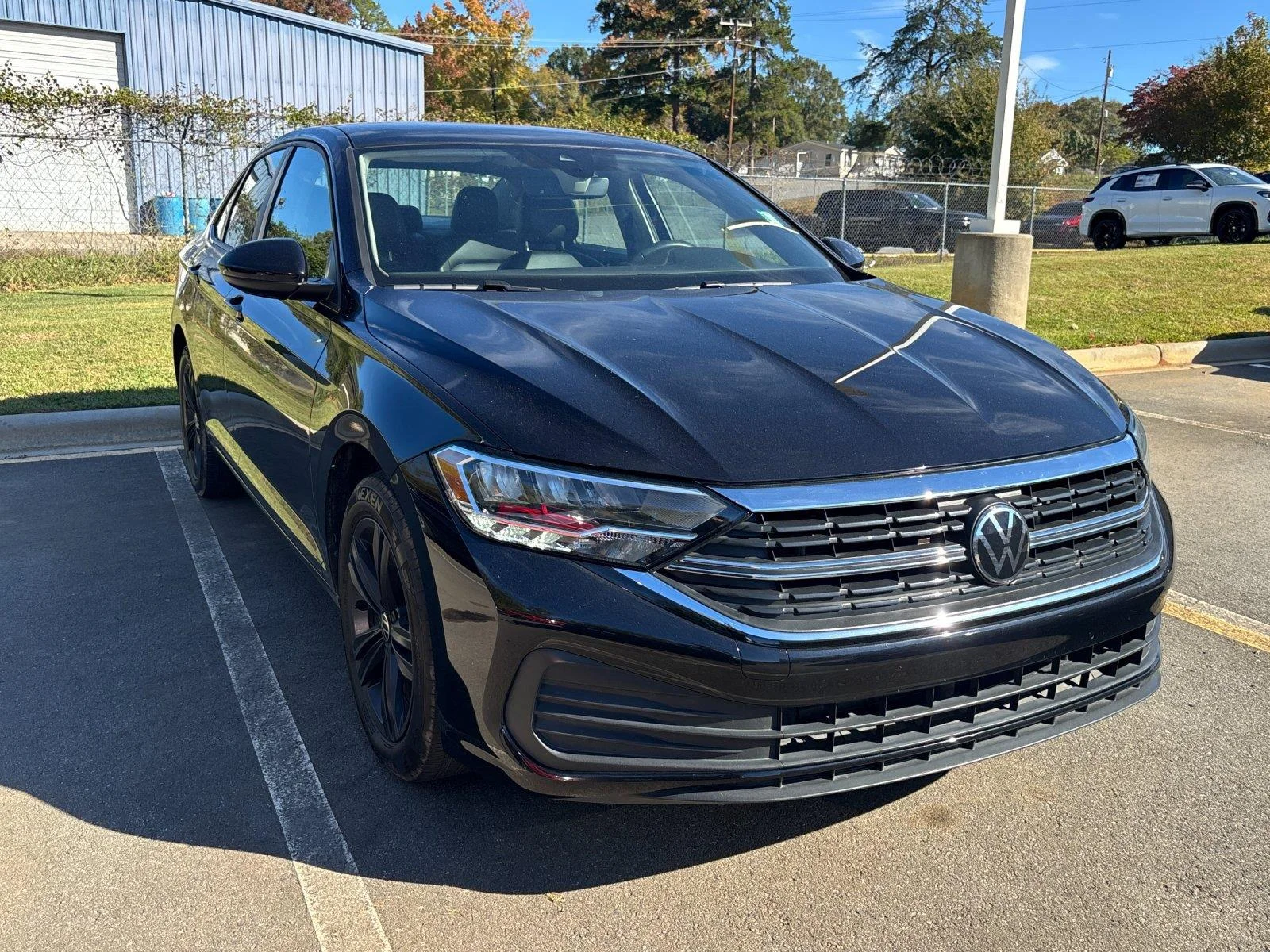 Used 2023 DEEP BLACK VOLKSWAGEN SE image 7