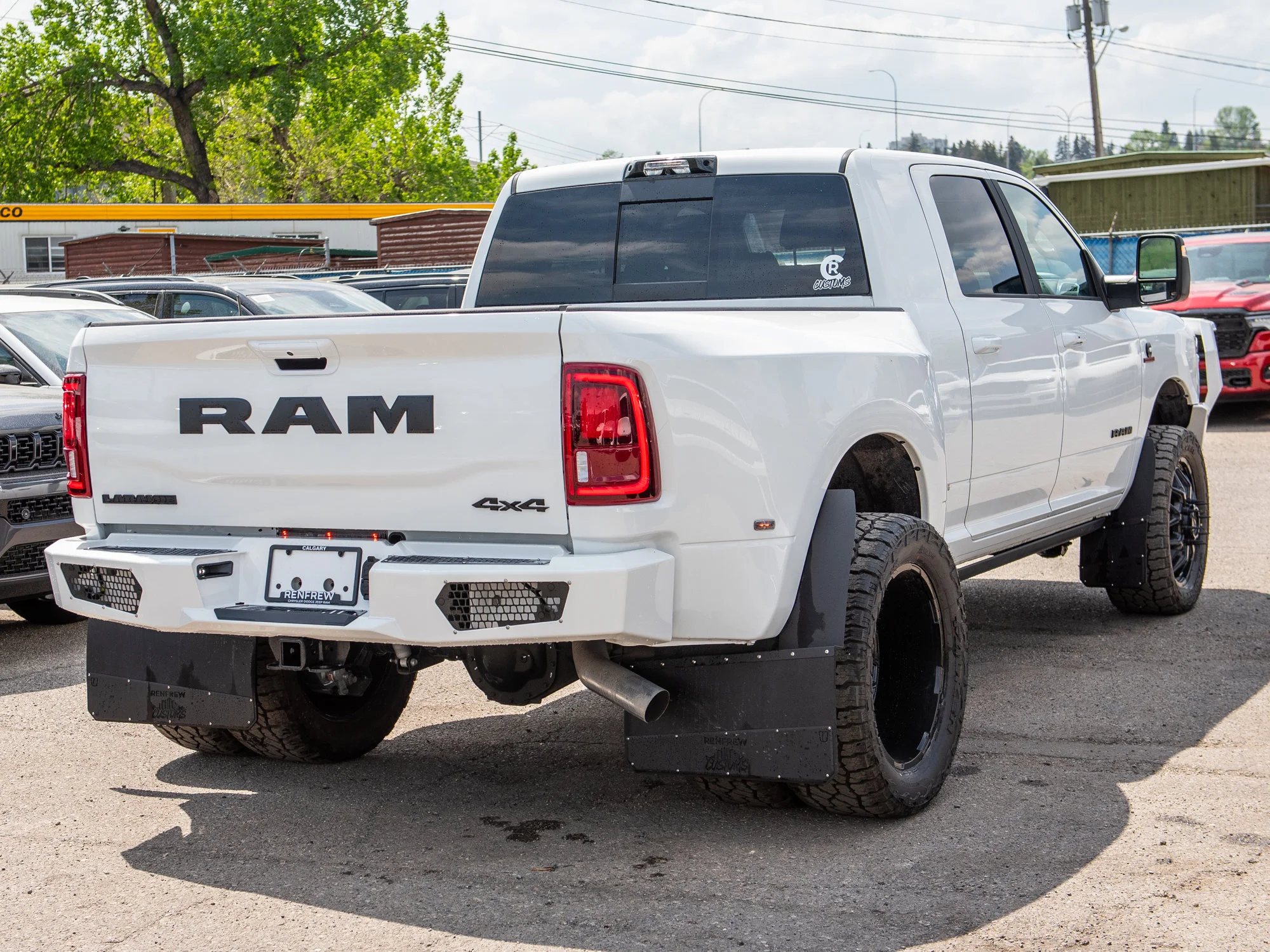 New 2026 White RAM Laramie* Mega Cab, 2 Inch Lift, 35 Inch Tires, Trigger Industries Bumper image 13