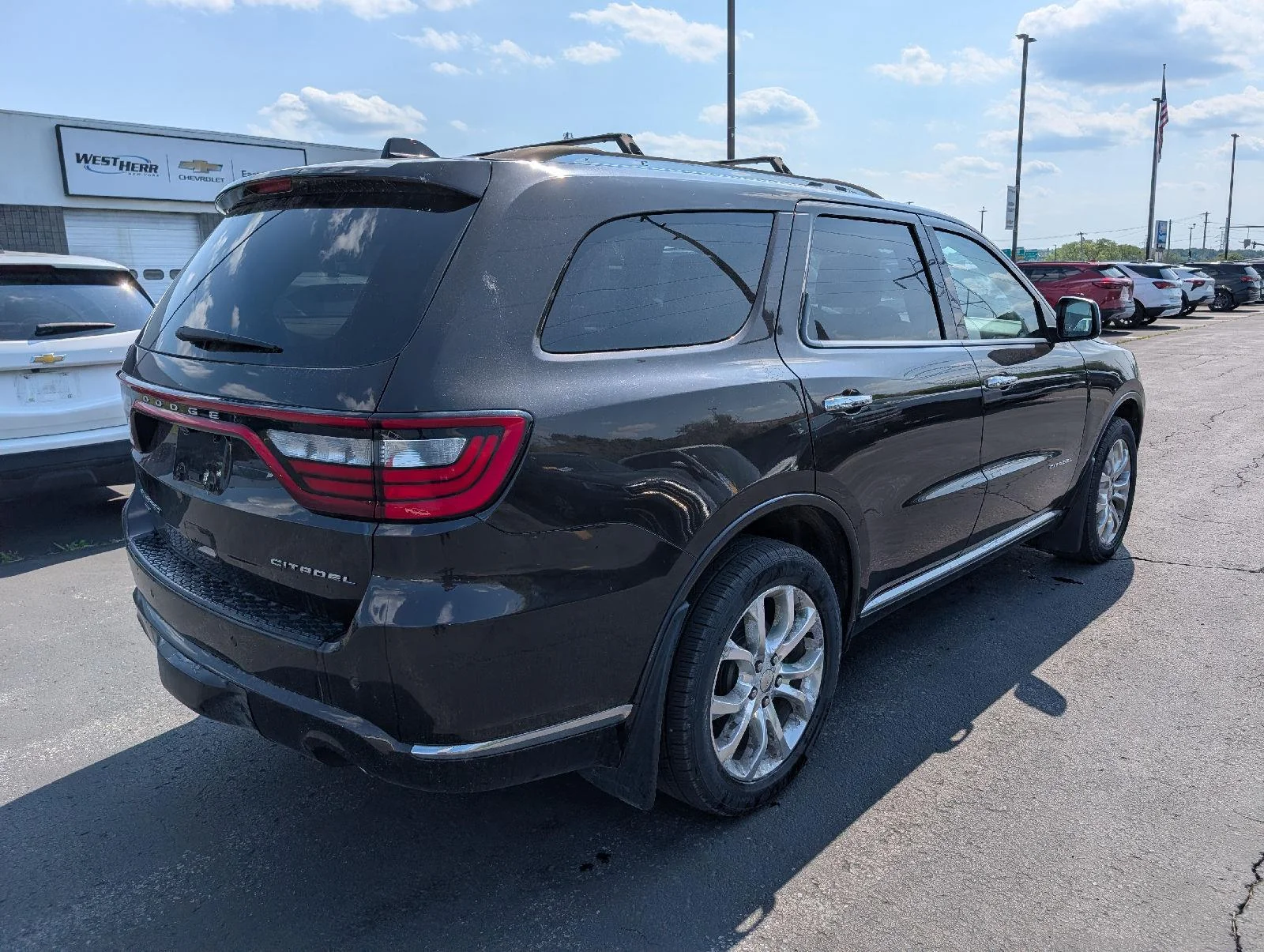 Used 2016 Luxury Brown Pearlcoat Dodge Citadel image 7