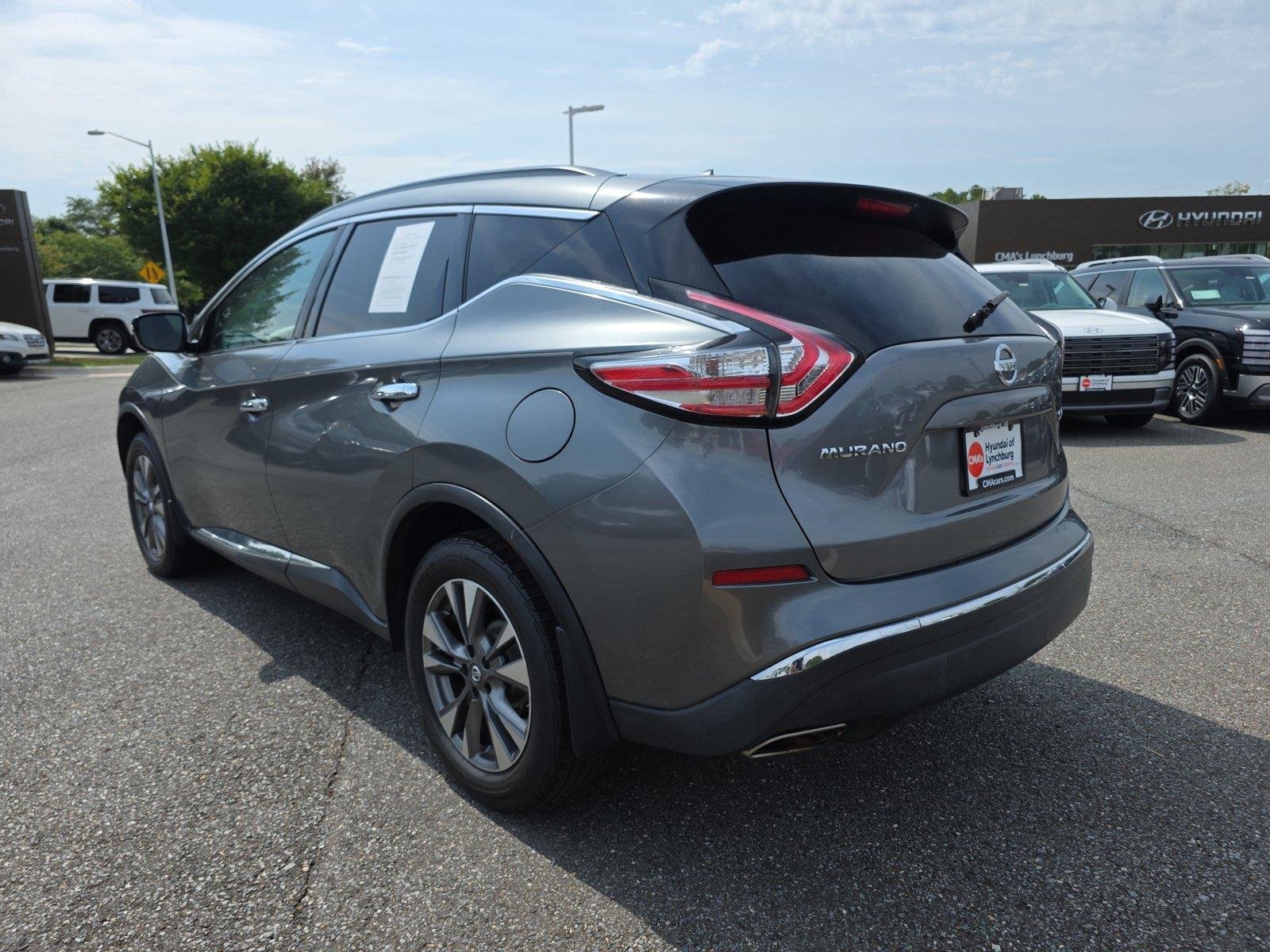 Used 2016 Gun Metallic Nissan SV image 10