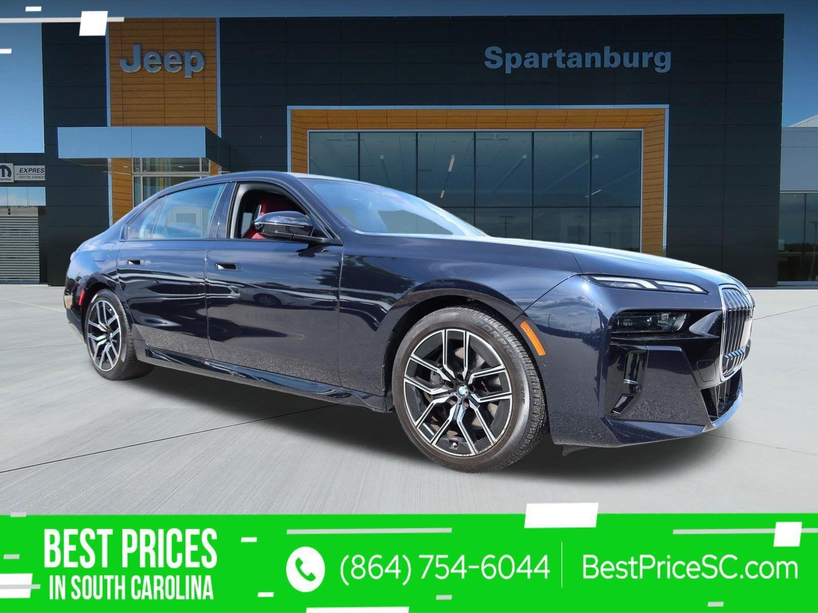 Used 2025 Carbon Black Metallic BMW 740i xDrive image 1
