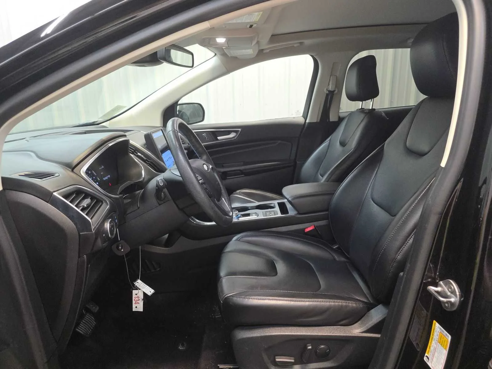 Used 2021 Agate Black Metallic Ford Titanium image 7