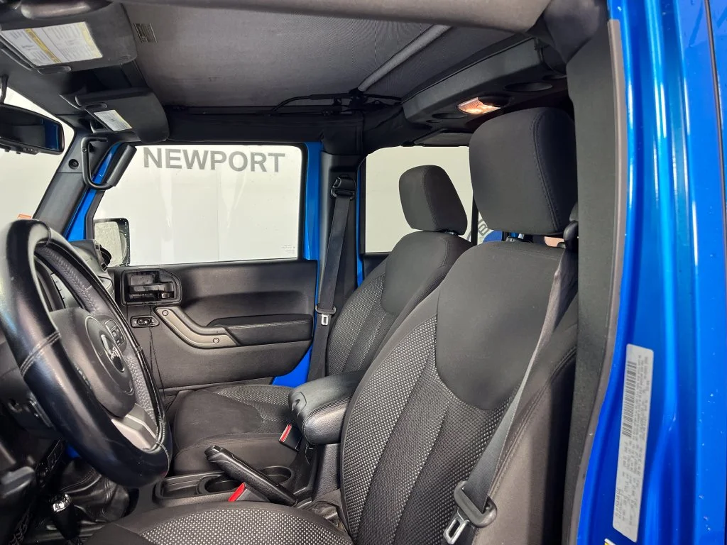 Used 2016 Blue Pearl Jeep Unlimited Sport image 2