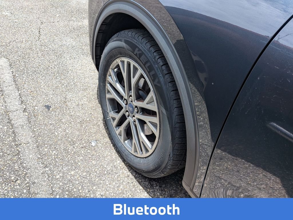 Used 2022 Blue Metallic Ford SEL image 6