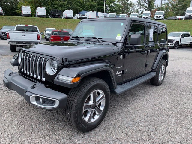 Used 2022 Black Jeep Unlimited Sahara image 4