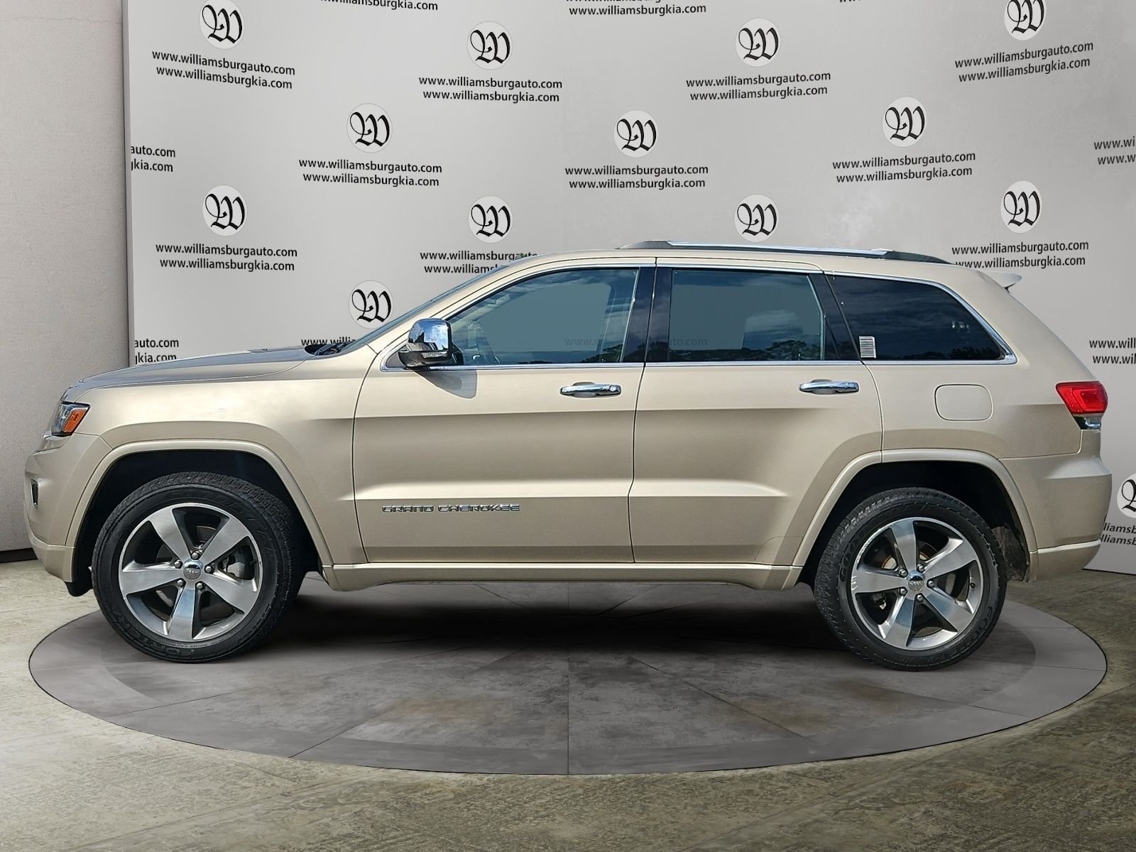 Used 2014 Gold Jeep Overland image 2