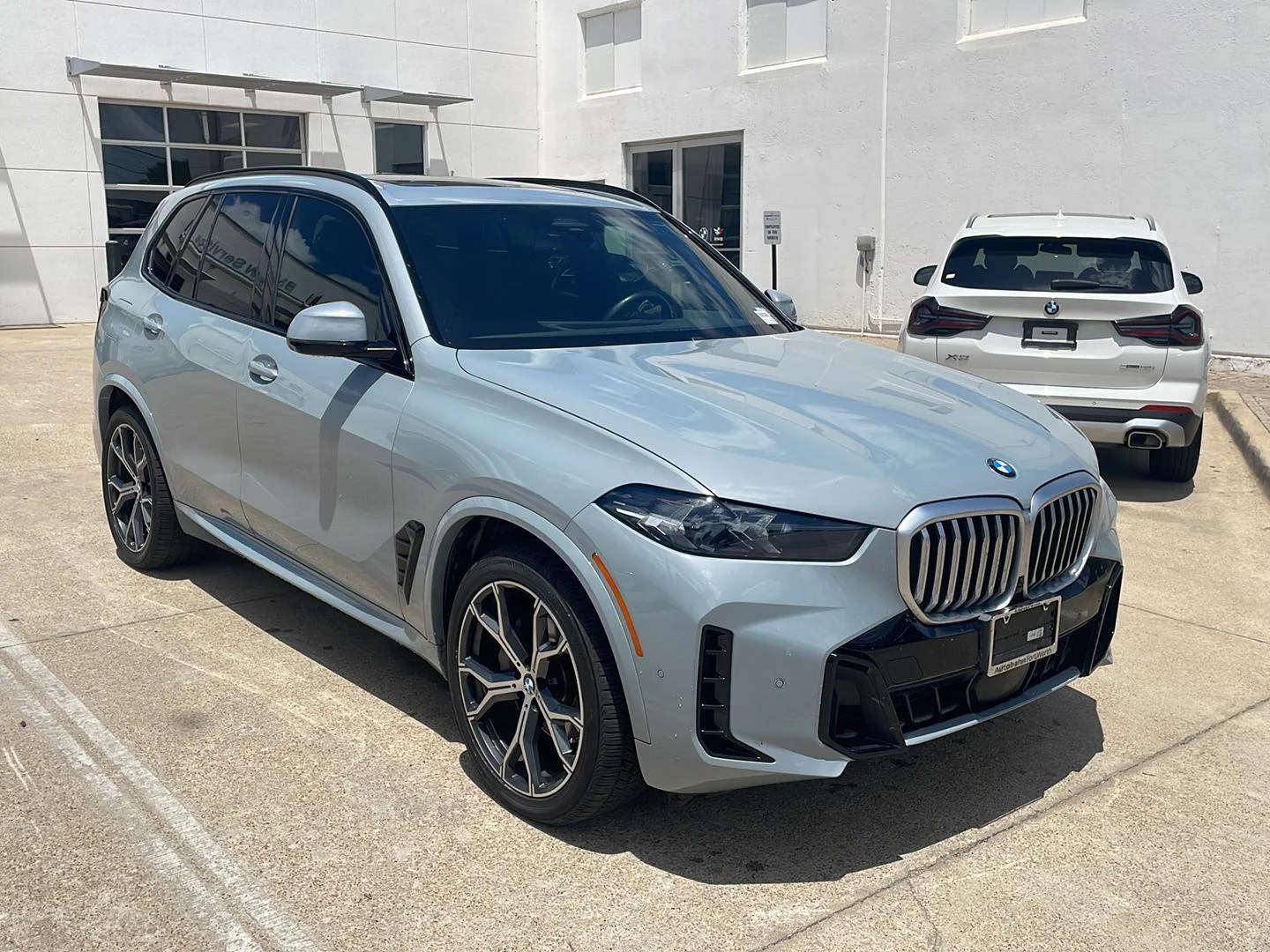Used 2024 Brooklyn Grey Metallic BMW xDrive40i image 2