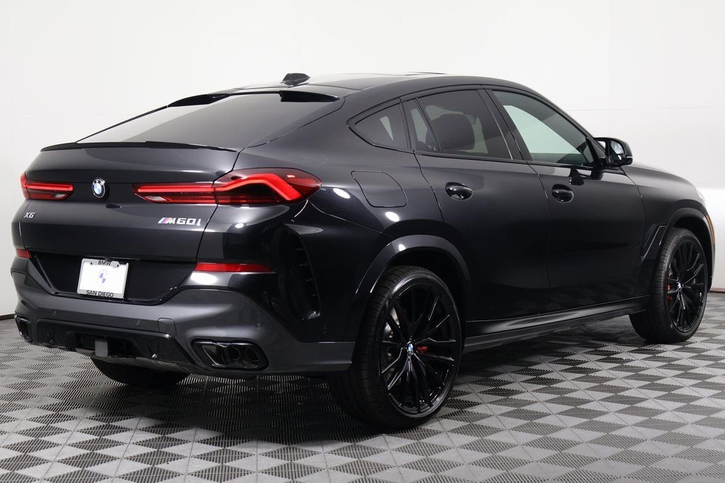 New 2027 Black Sapphire Metallic BMW M60i image 2
