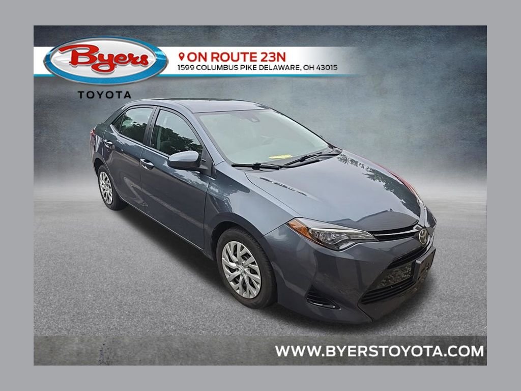 Used 2017 Slate Metallic Toyota LE image 1