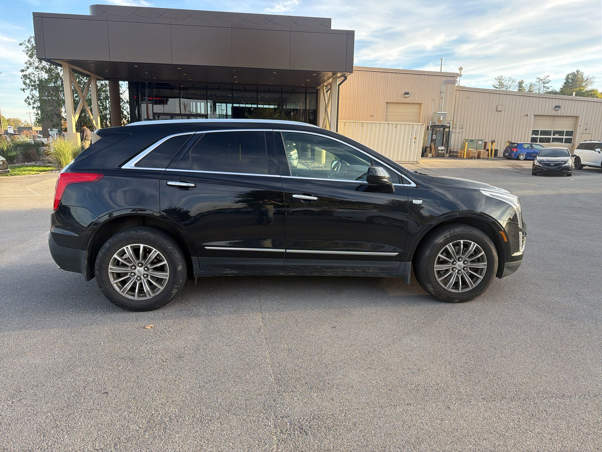 Used 2017 Stellar Black Metallic Cadillac Luxury AWD image 2