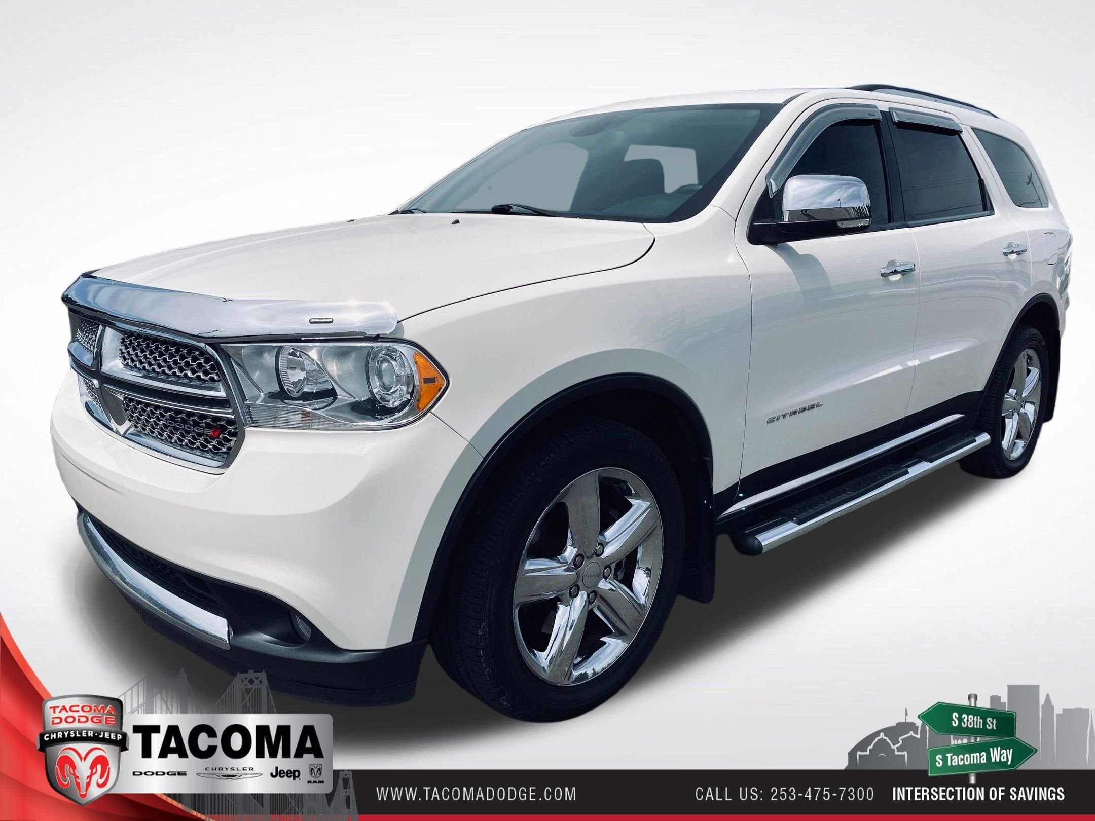 Used 2012 White Dodge Citadel image 1