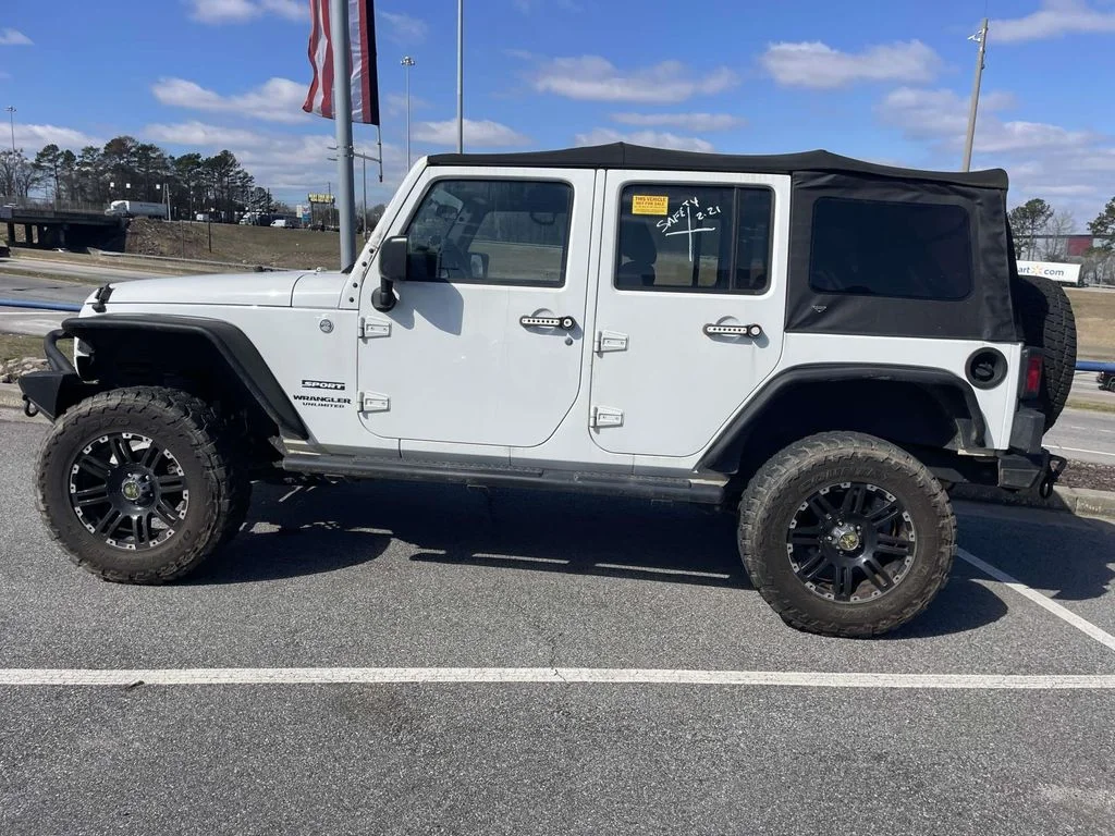 Used 2015 White Jeep Unlimited Sport image 6